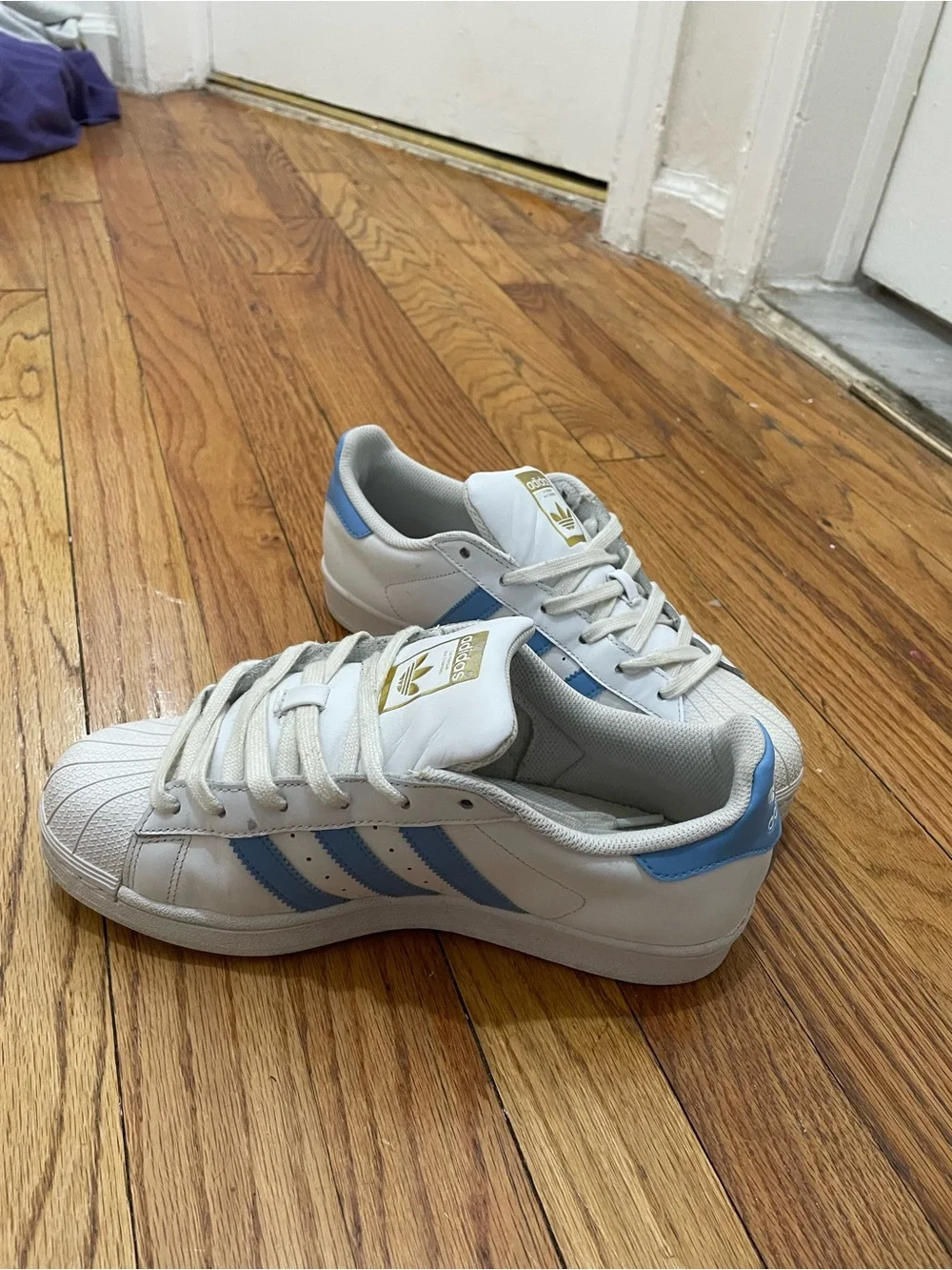 adidas Superstar Men’s Sneakers in White with Light Blue Stripes